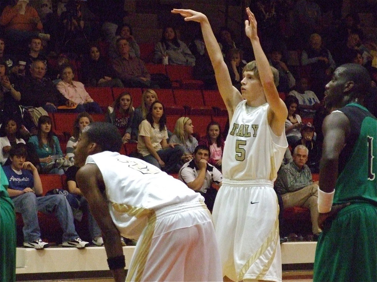 Image: Colton uses form — Colton Campbell(5) swishes a free throw.