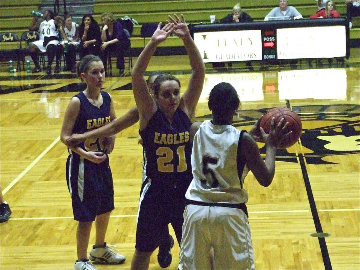 Image: On the side — Despite the Eagles’ best efforts, Jameka Copeland(5) inbounds the ball easily.