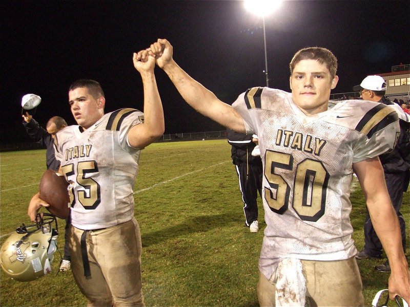 Image: Ross Enriquez and Ethan Simon stand united — Ross Enriquez and Ethan Simon stand united during the Italy school song after the Gladiators beat the Axtell Longhorns 13-0 Friday night. Italy’s district record improves to 2-0 as they prepare for a home game against Hubbard on October 16.