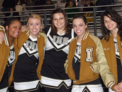 Image: Cheerleaders all smiles — The IHS Cheerleaders had fun during the game.