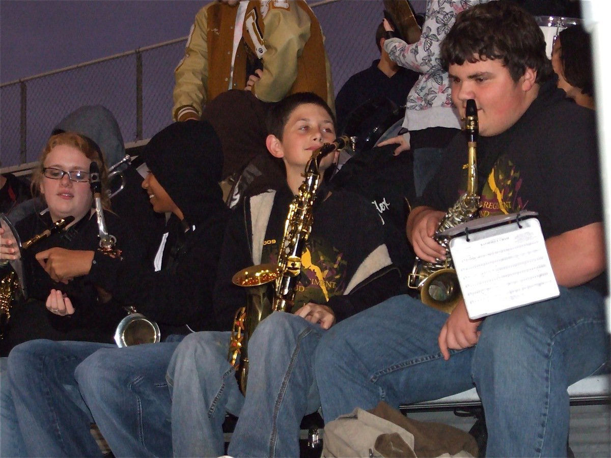 Image: We rock! — Members of the Gladiator Regiment Band had a blast performing from the stands.