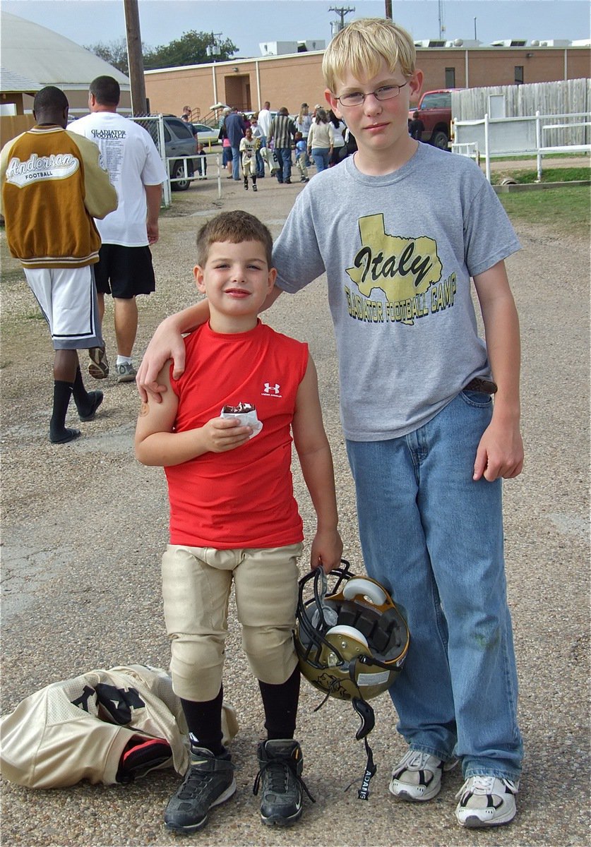 Image: Italy bites the Bulldogs — Gage Wafer and Cody Boyd pose after the IYAA C-Team beat the Rice Bulldogs 24-0 to become undefeated, undisputed, unstoppable and unscored on division champs at 6-0…unbelievable!