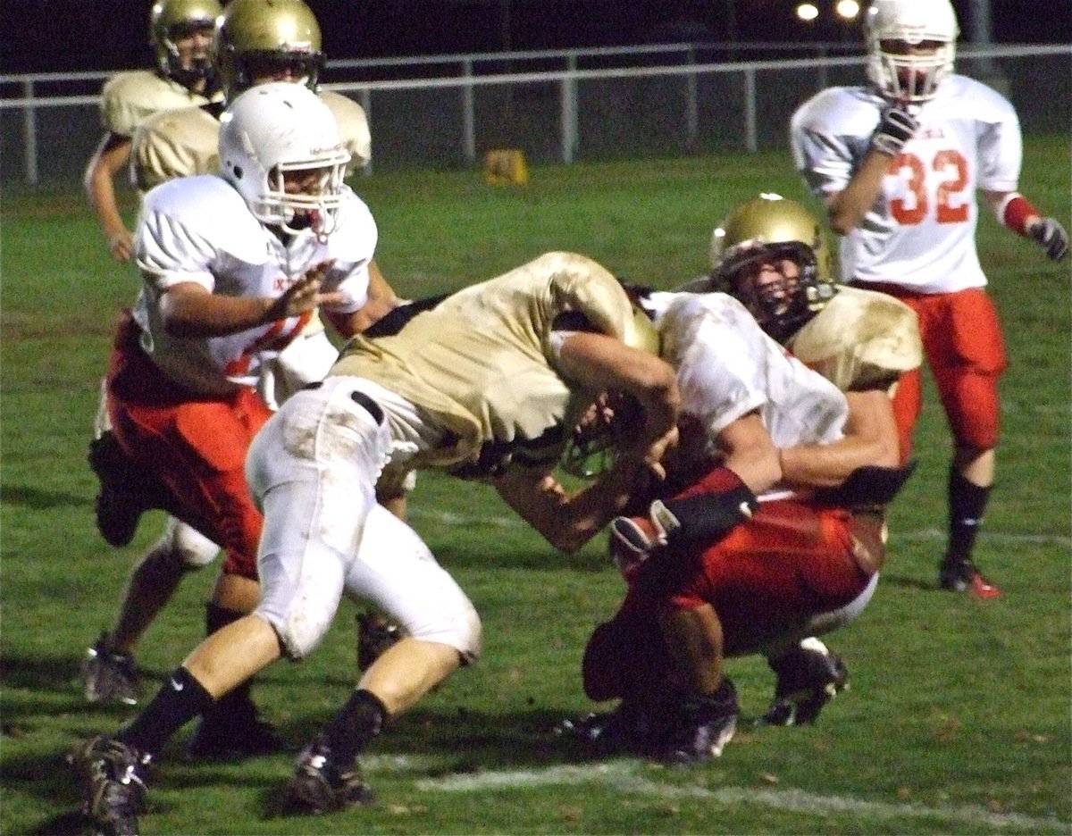 Image: Yee-Haw! — Chace Hamilton and Ethan Saxon corral a Longhorn.