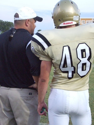 Image: Coach Bales and Ryan — Coach Bales talks to Ryan Ashcraft about the upcoming play.