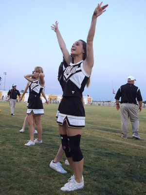 Image: Spirit Up — Gladiator cheerleader, Drew Windham, gets the crowd ready to roar.