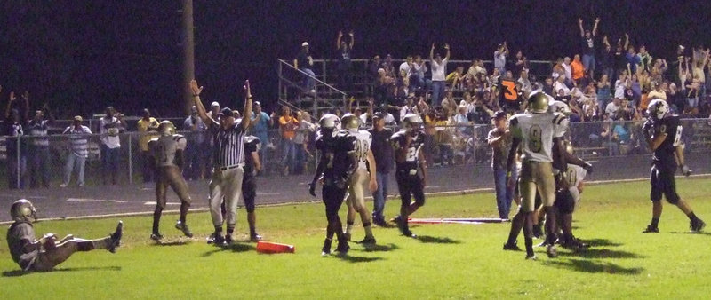 Image: Touchdown — Everyone agrees, that Italy quarterback Jasenio Anderson(11) scored the touchdown.