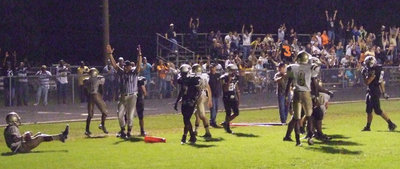 Image: Touchdown — Everyone agrees, that Italy quarterback Jasenio Anderson(11) scored the touchdown.