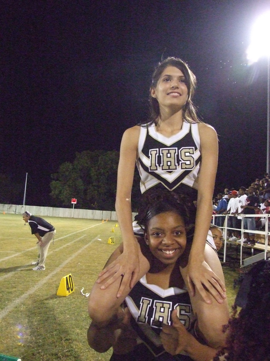 Image: Beverly and Jaleecia — Beverly Barnhart cheers from rafters with Jaleecia Fleming.