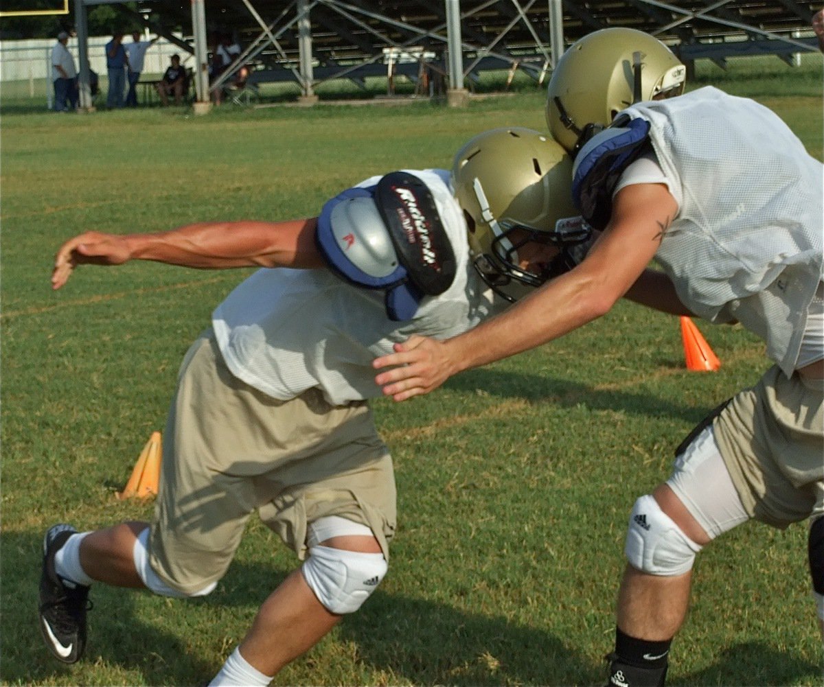 Image: Ethan’s turn — Ethan Simon wraps up Kyle Wilkins.