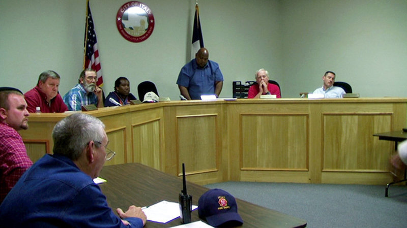 Image: Town Council — The Italy City Council: John Droll (who voted against the salary), Mark Souder, Dennis Perkins, Mayor Frank Jackson (standing), Greg Richards and Rodney Guthrie.