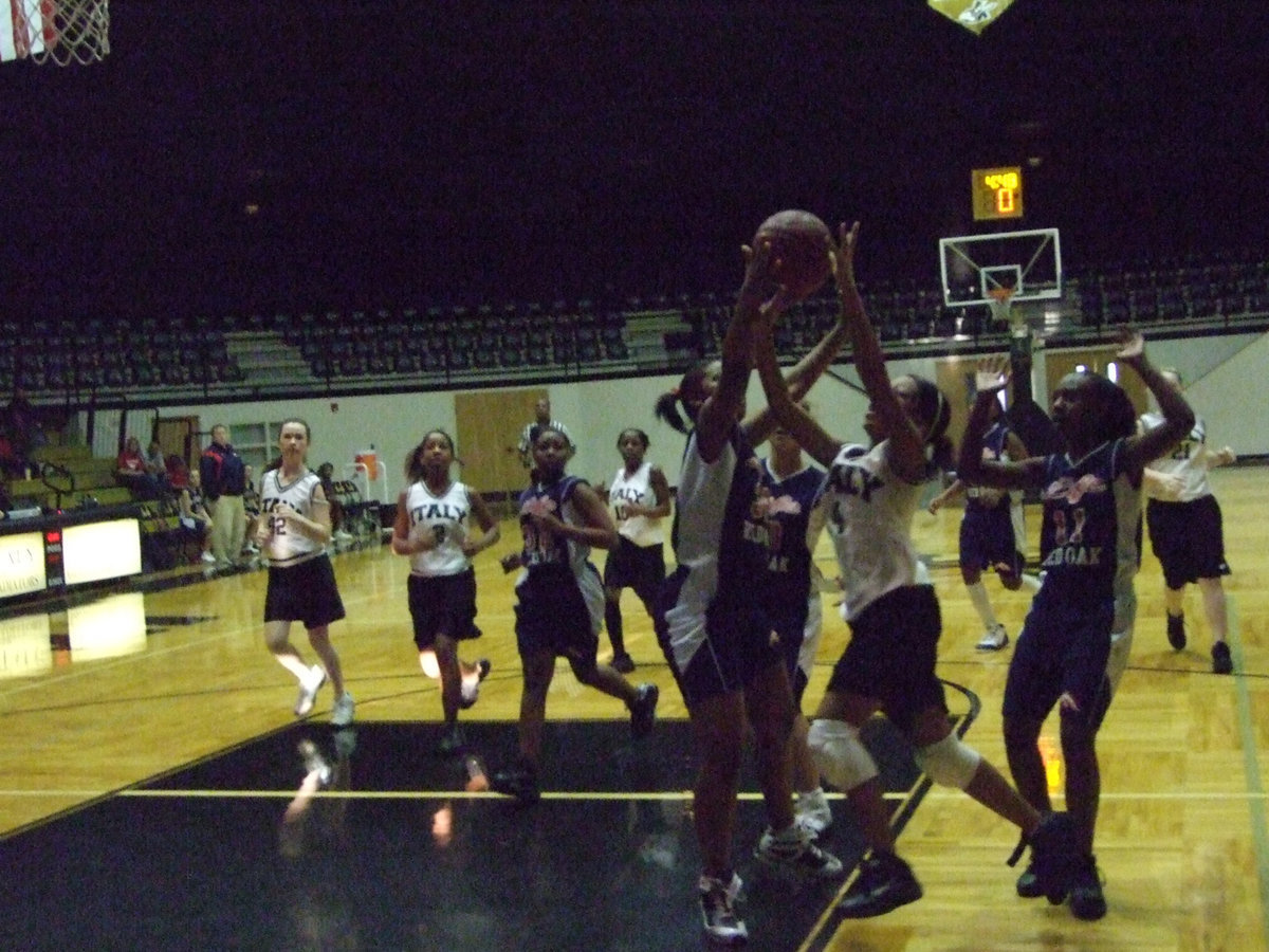 Image: Copeland Attacks — Italy’s #4 Ryisha Copeland tries to make a play for the the Lady Gladiators JH squad.