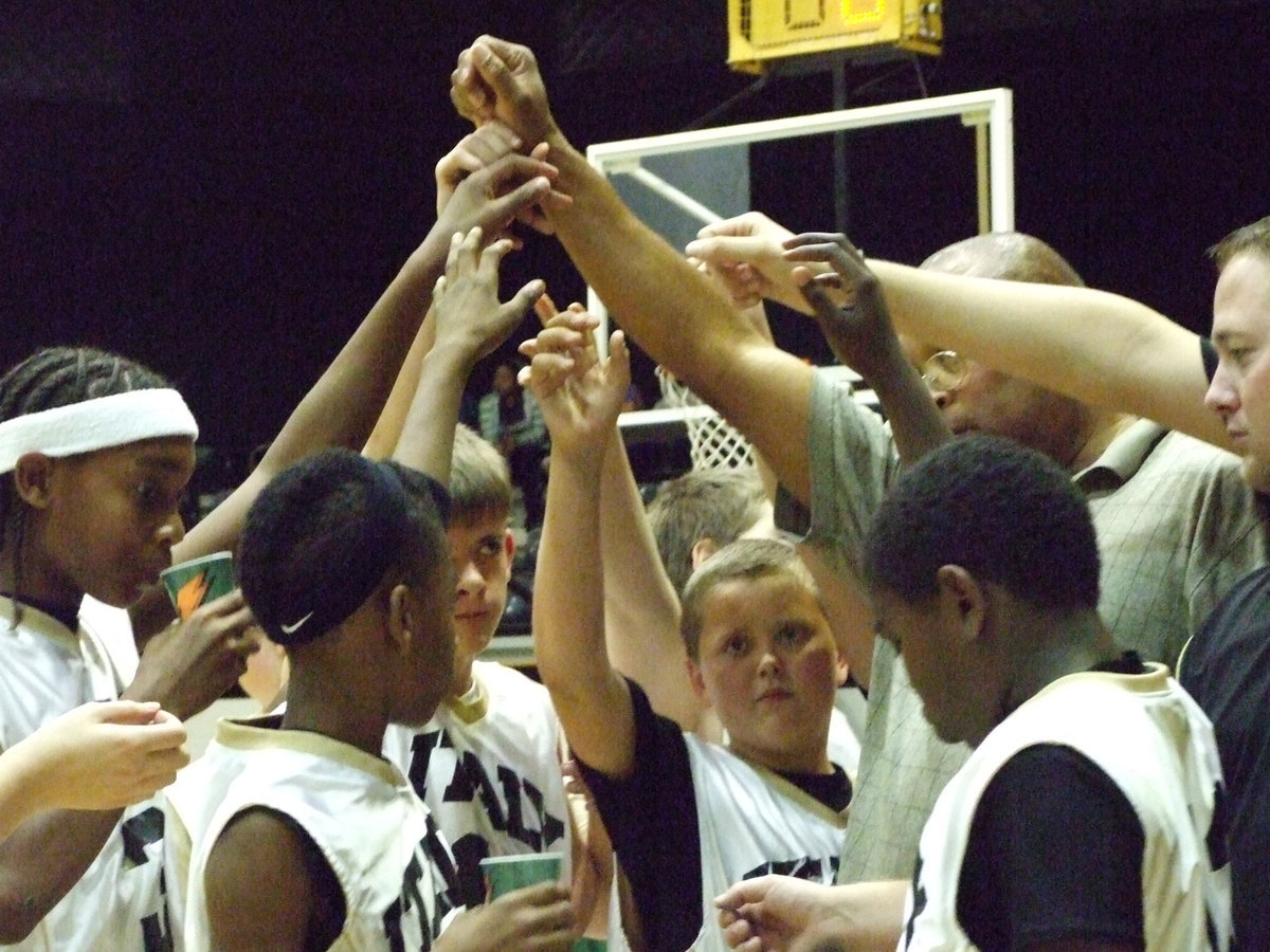 Image: Let’s Do This! — The Italy 7th grade boys break the huddle and then try to break the Mustangs.