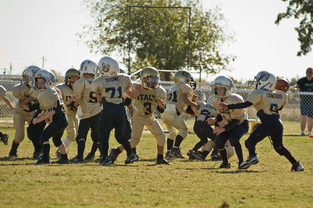 Image: Pass, Pass, Pass! — 3-Jacob Wiser tries to pressure the palmer quarterback near Italy’s own endzone.