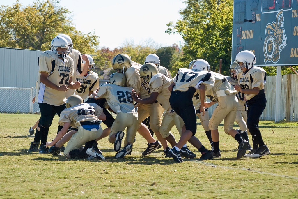 Image: Team Work — The A-Team defense tries to make a goaline stand.