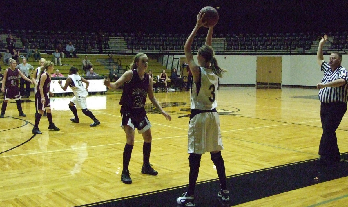 Image: Kaitlyn Rossa — Rossa searches to throw in the ball.