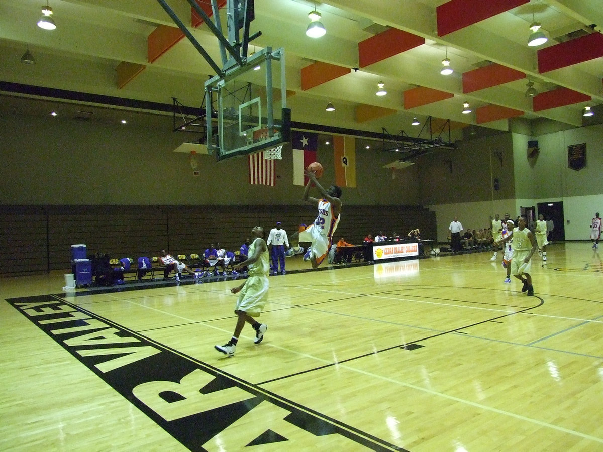 Image: Gators Can fly? — Athletes from both teams put on a show for the fans.