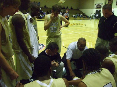 Image: Strategizing — A total team effort between coaching staff and players made the difference in this one.