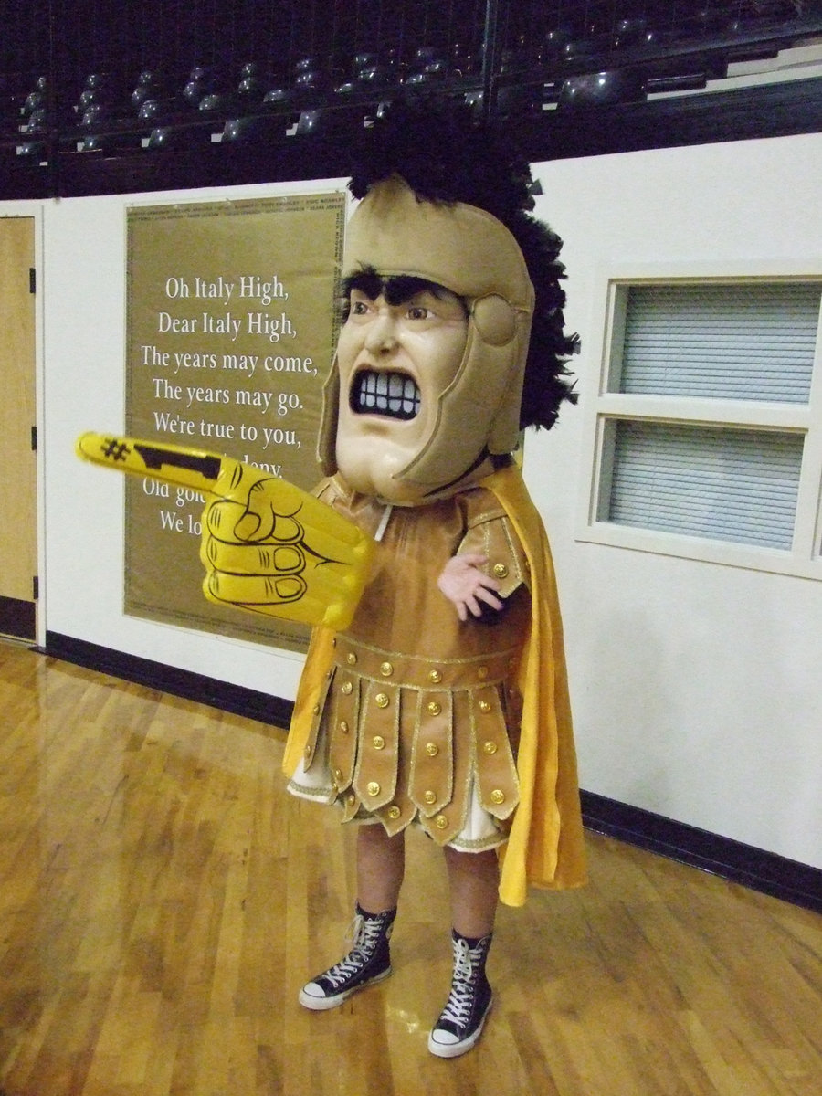 Image: The Gladiator — The Lady Gladiators hosted Grand Prairie AA Tuesday night.  Italy was on top of their game as the score ended 61-16. The Gladiator mascot was released because, “If the finger glove doesn’t fit, you must acquit.”