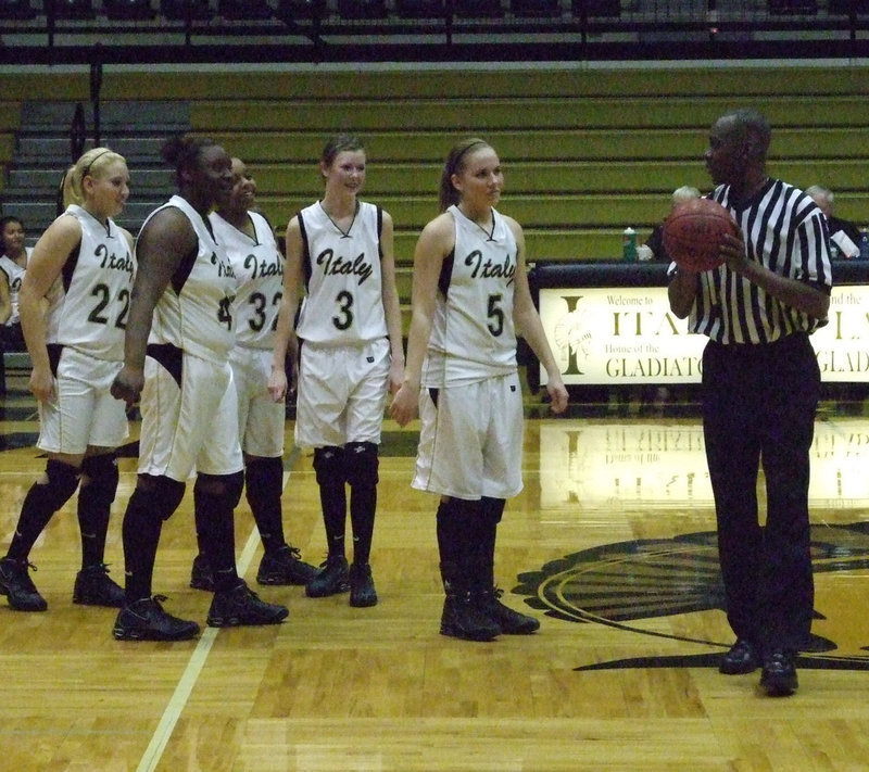 Image: After the break — Standing trial, Richards, Reed, Fleming, Rossa and DeMoss listen to the ref (Judge) after the break Tuesday night. The “Famous Five” denied accusations that they stole Grand Prairie’s basketball.