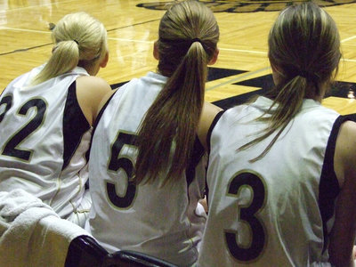 Image: Richards, DeMoss, Rossa — The Lady Gladiators take a break while awaiting sentencing in the “Court of Basketball” for taking advantage of Grand Prairie AA.