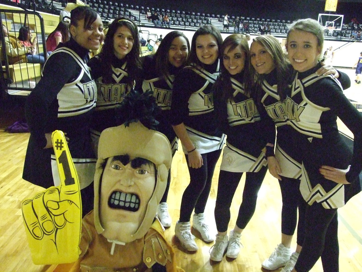 Image: All-District enemy #1 — In a cheerleader lineup, the Gladiator mascot thinks he knows who done it.