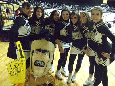 Image: All-District enemy #1 — In a cheerleader lineup, the Gladiator mascot thinks he knows who done it.