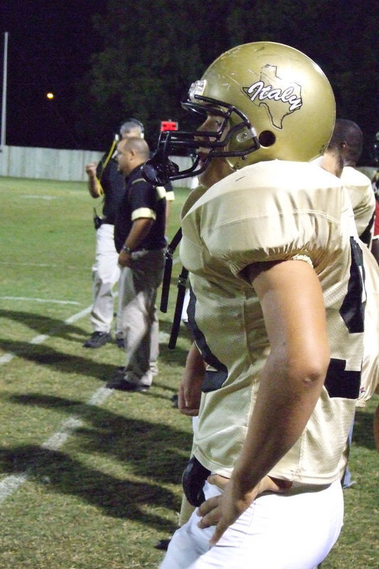 Image: Ethan Simon — #50 Ethan Simon watches from the sideline.