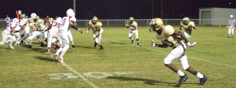 Image: Gladiators have the ball — #63 Zach Hernandez, #7 Jasenio Anderson, #20 Clay Major and #10 John Isaac.