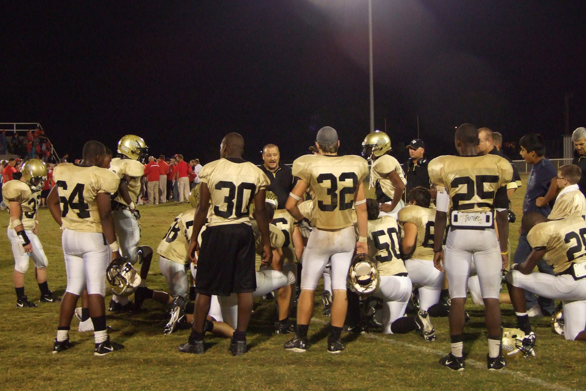 Image: The Somber Speech — Coach Bales speaks to the Gladiators after the battle.
