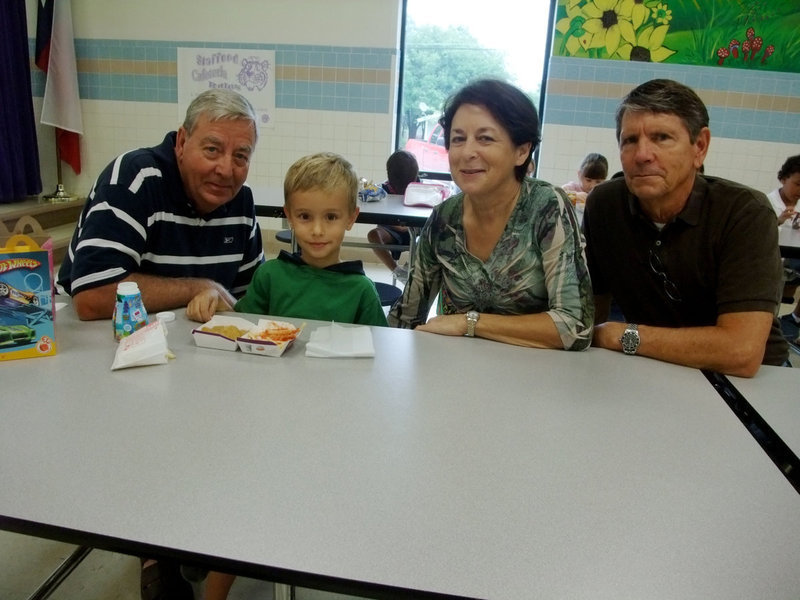 Image: Looks like a Happy Meal to me! — Creighton is enjoying his visit from his grandparents Dorothy and Don Creighton and Jimmy Hyles