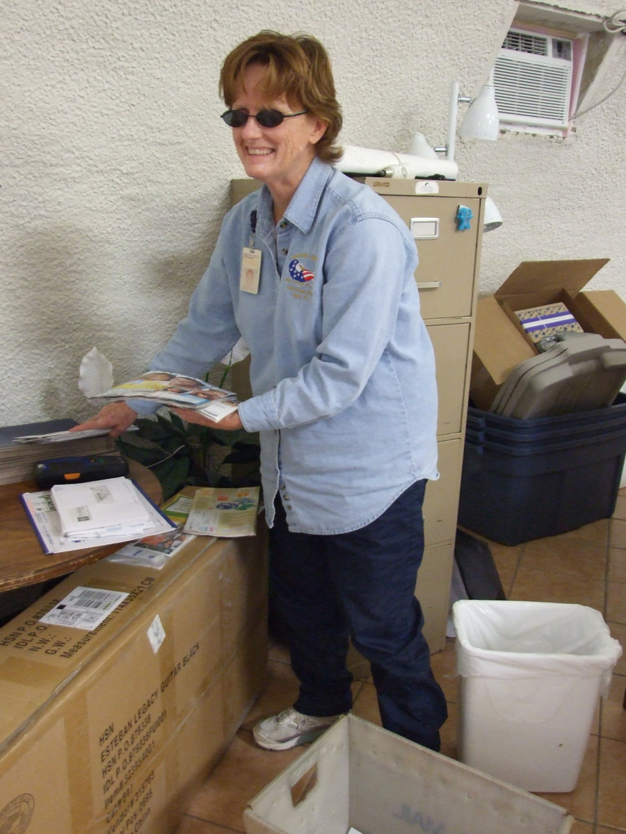 Image: Jacque at Work — Jacque is delivering mail and sorting it too.