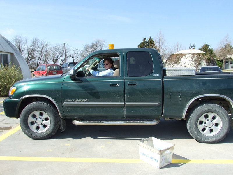 Image: Here Comes the Postman — Jacque in her mail truck.