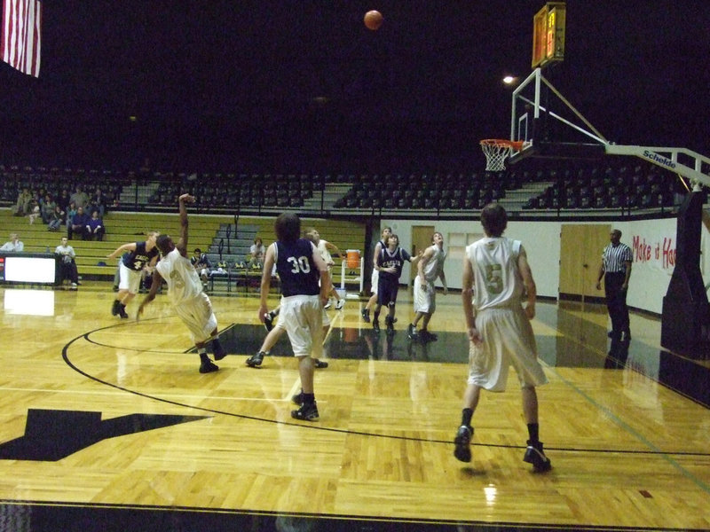 Image: Deandre fades — Deandre Sephus #3 hits a fade away jump shot against Waxahachie Advantage.