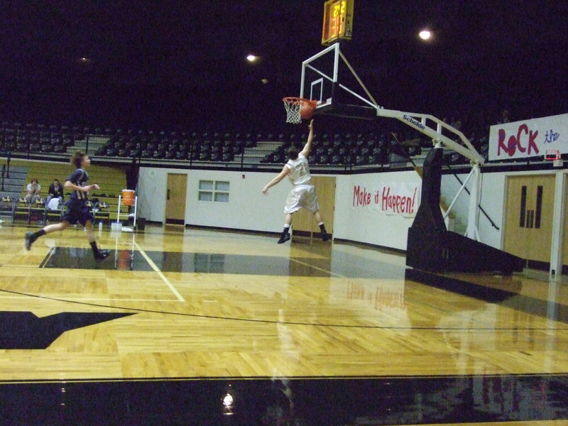 Image: “Special K” Saxon — Ethan Saxon #21 grabs some air and 2-points against the Eagles.