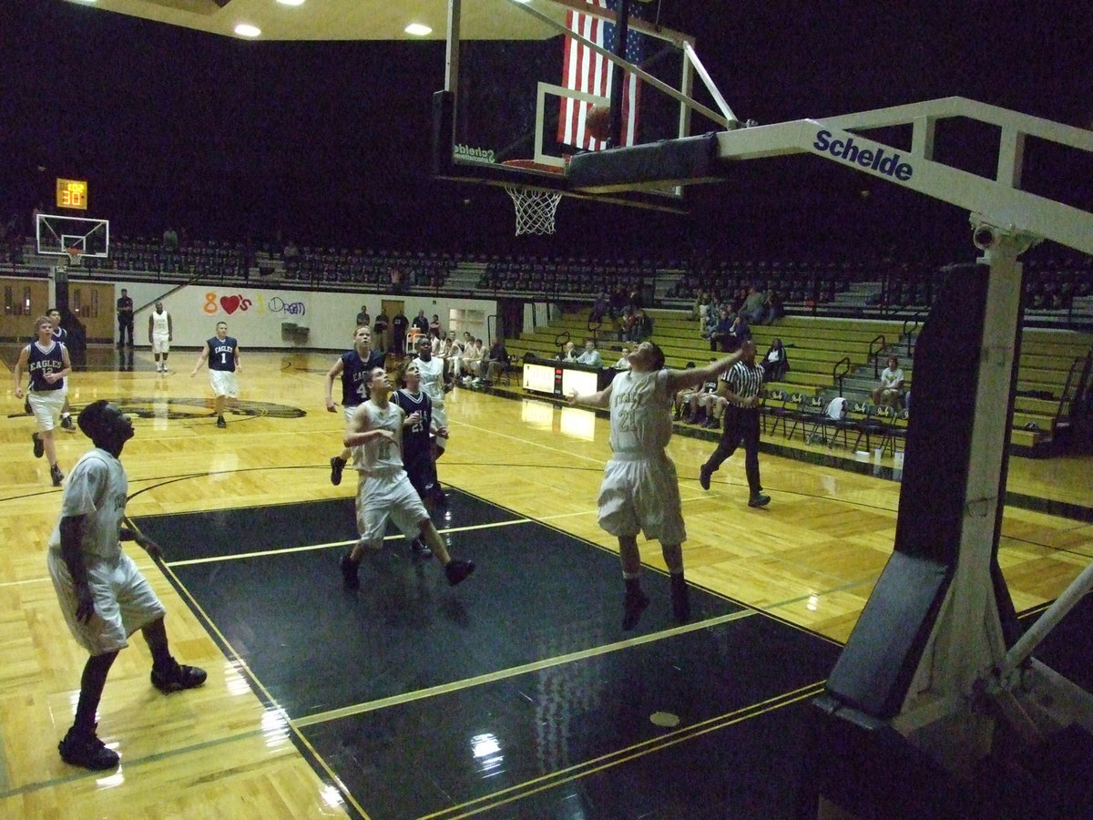 Image: Saxon soars — Ethan Saxon #21 kisses one off the glass.