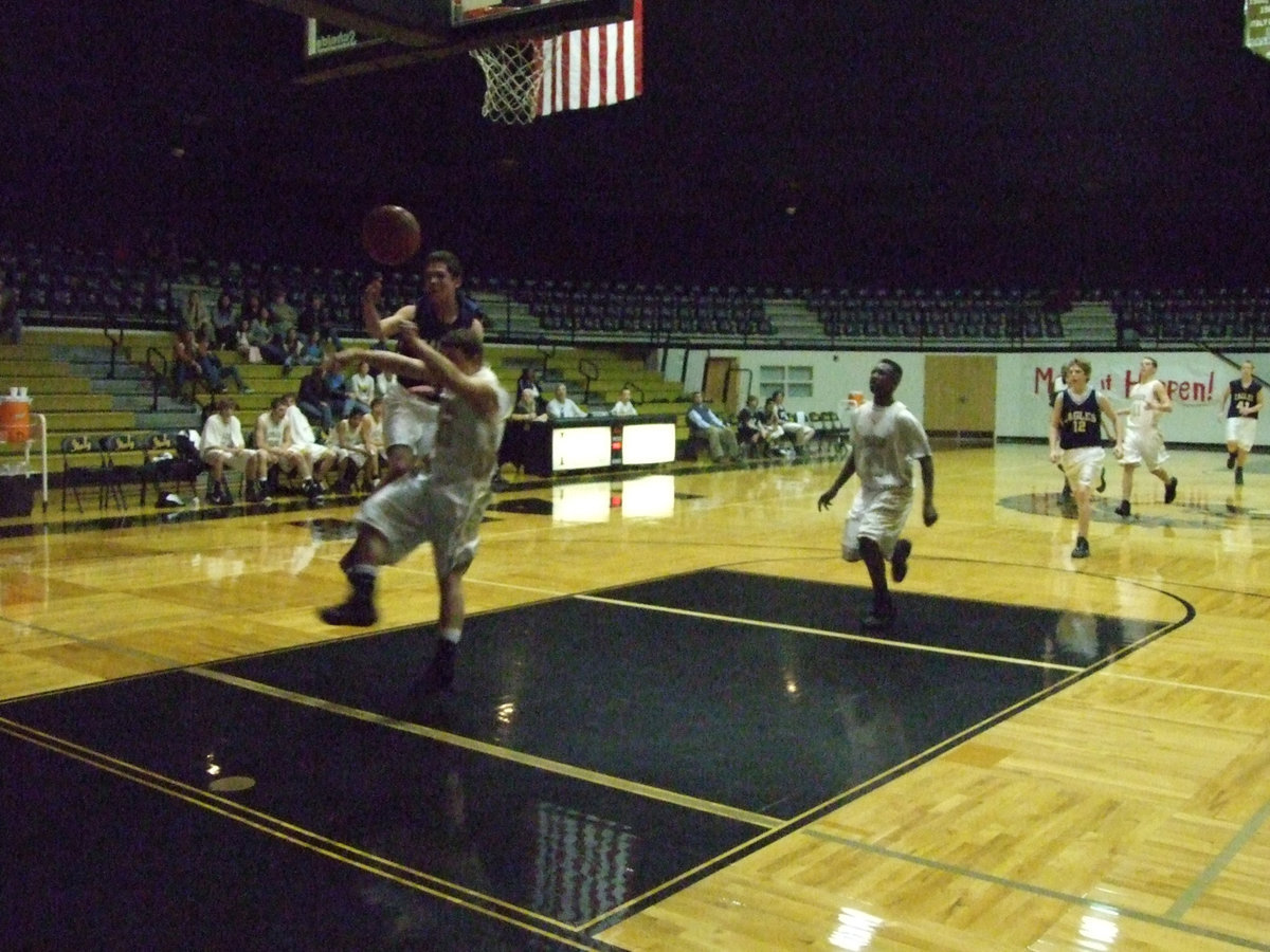 Image: Saxon shows off — Ethan “Special K” Saxon perches an Eagle on his arm while the Eagle spins the ball. Now that’s tricky.