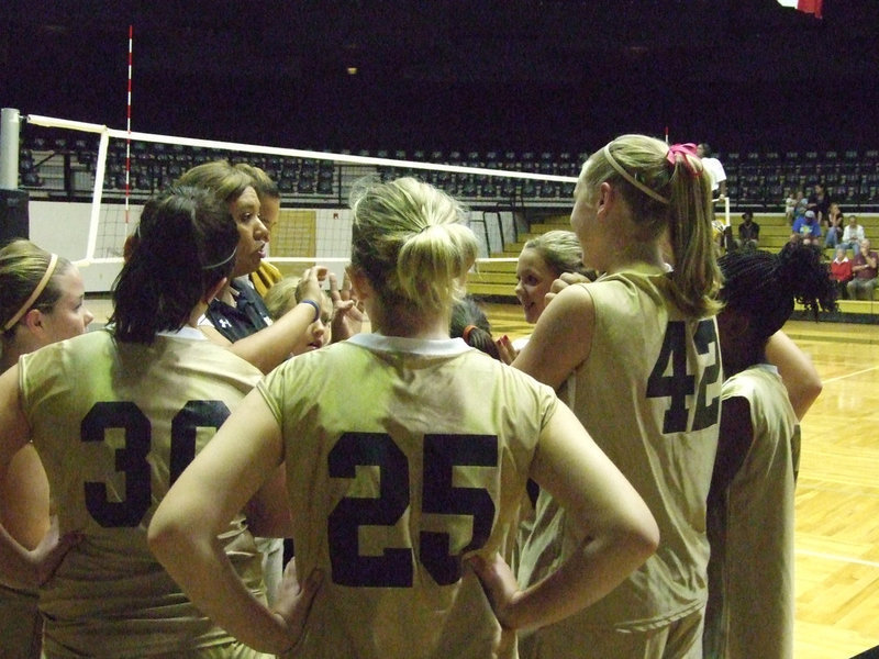 Image: 7th grade gets instructions — Coach Tina Richards tells the girls what is needed.