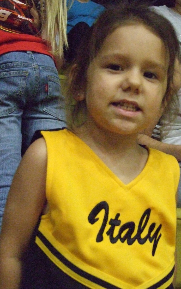 Image: Lil’ Ella — Sandy and Larry Eubank’s granddaughter, Ella, cheers for the Lady Gladiators in the cheerleading outfit she got for her birthday.