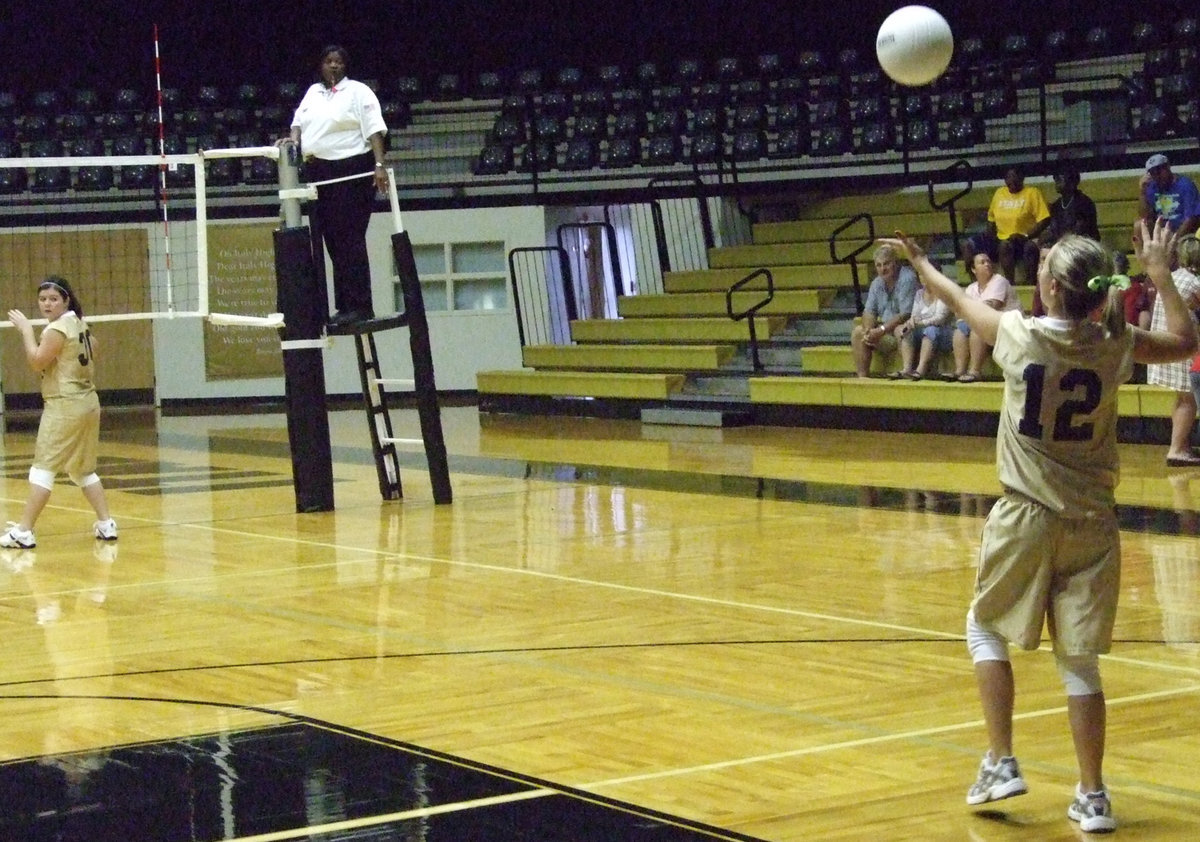 Image: Bailey, serve it up — The Lady Gladiators win against the Lady Bulldogs in two sets.