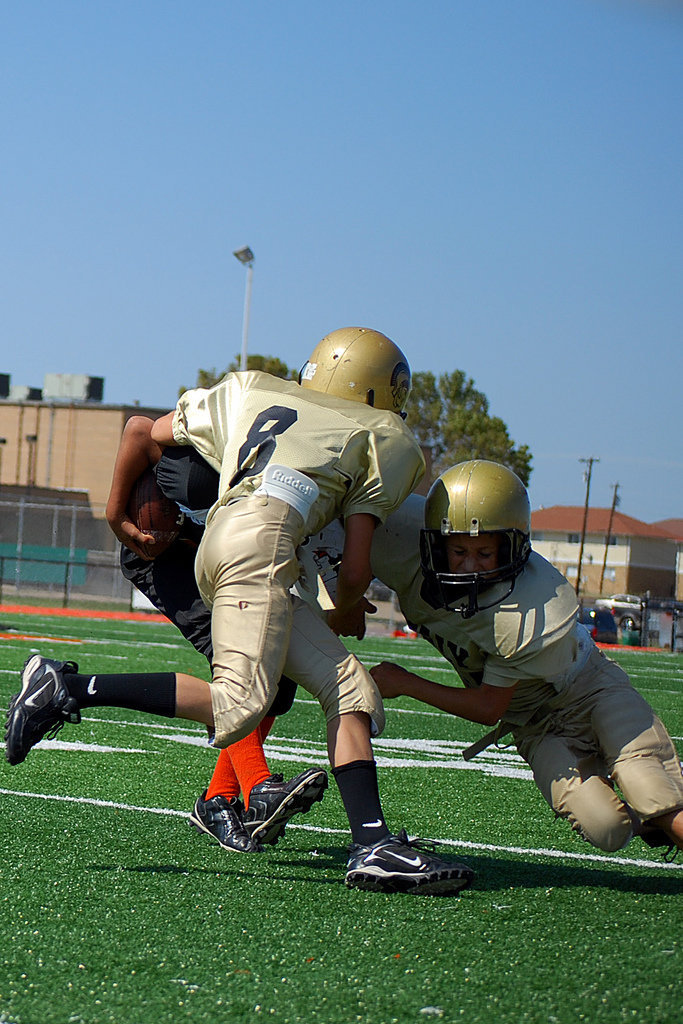 Image: A team tackle — The A Team gives a good tackle.