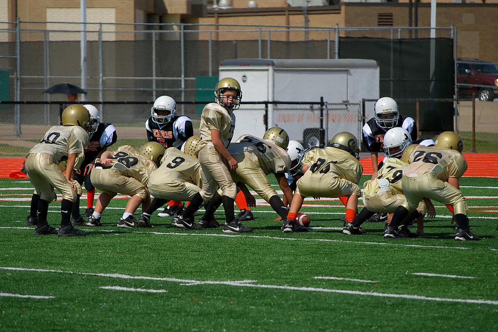 Image: Snap — IYAA B team snaps the ball.