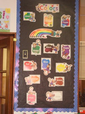 Image: Colorful classroom decorations — Mrs. Low’s wall art displays names and splashes of colors for her young students.