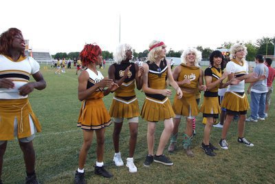 Image: Powder Puff Cheerleaders — Cheerleaders (L-R) Delicious Christy-Curtis Cole, Lucious Ladasia-Anthony “Day-Day” Johnson, Buddalicious-Darrin Moore, Kinky Kory-Kory Hughes, Dirty Deliliah-Clay Major, Chase Elaine-Chase Michaels and Tantalizing Toodles-Tyler Boyd.