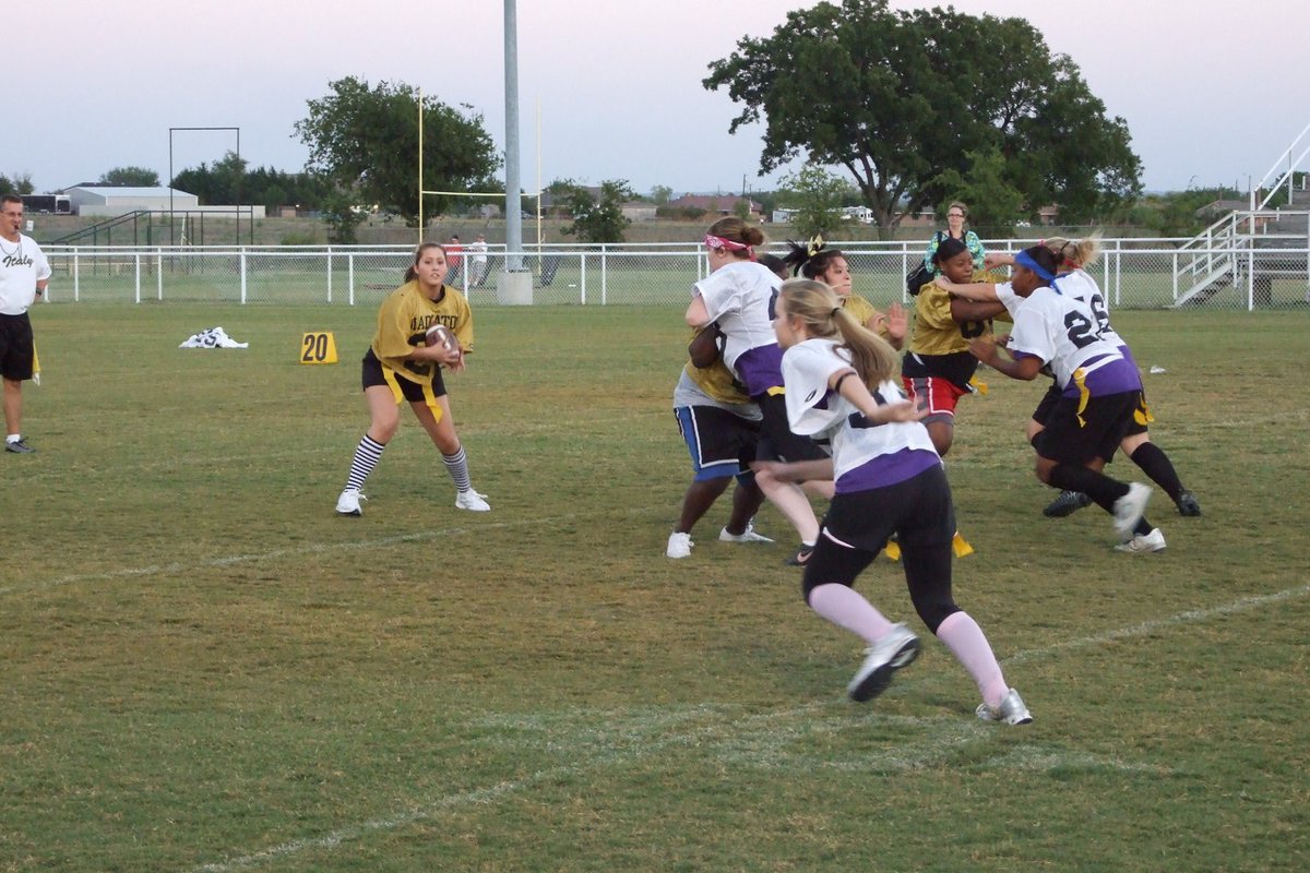 Image: Quarterback Angelica Garza — Garza searches for a receiver.