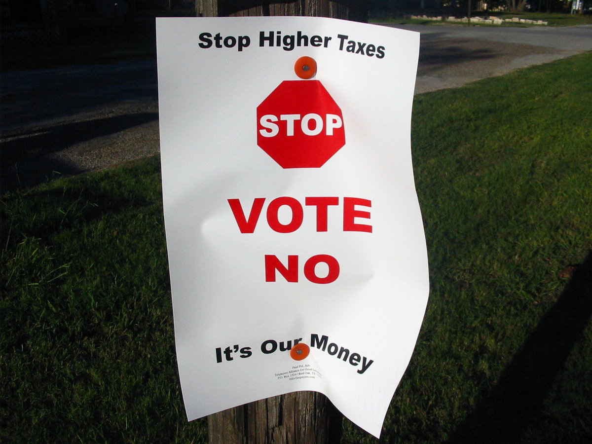 Image: Election sign in question — These signs were also posted along Highway 34.