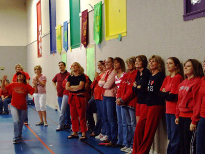 Image: Teachers all in red — Red Ribbon week, teachers all dressed in red.