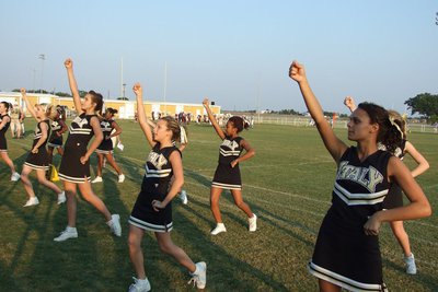 Image: IJH Cheerleaders — The cheerleaders take time to get the crowd crunk!