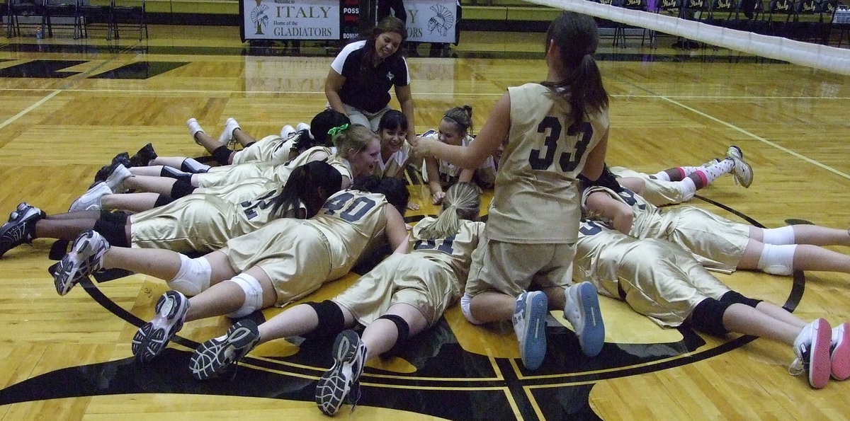 Image: The winner’s circle — The Lady Gladiators circled around the Lady Bears from Frost Monday night.  There was no way out and Italy took it to the end.  Way to go, Ladies!