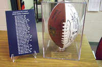 Image: Autographed NFL Cowboys football — 2008 Cowboys’ football will be given away during halftime at Homecoming.