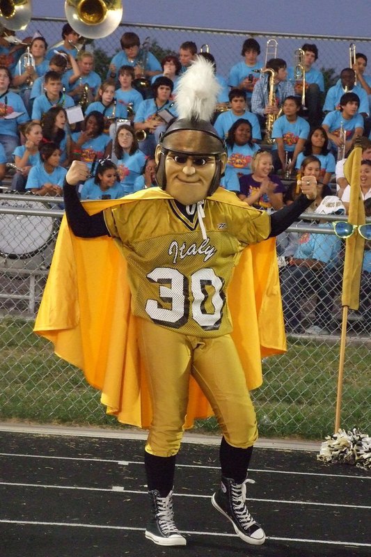 Image: Our beloved mascot — Our beloved mascot, the Gladiator flexes in front of the fans.